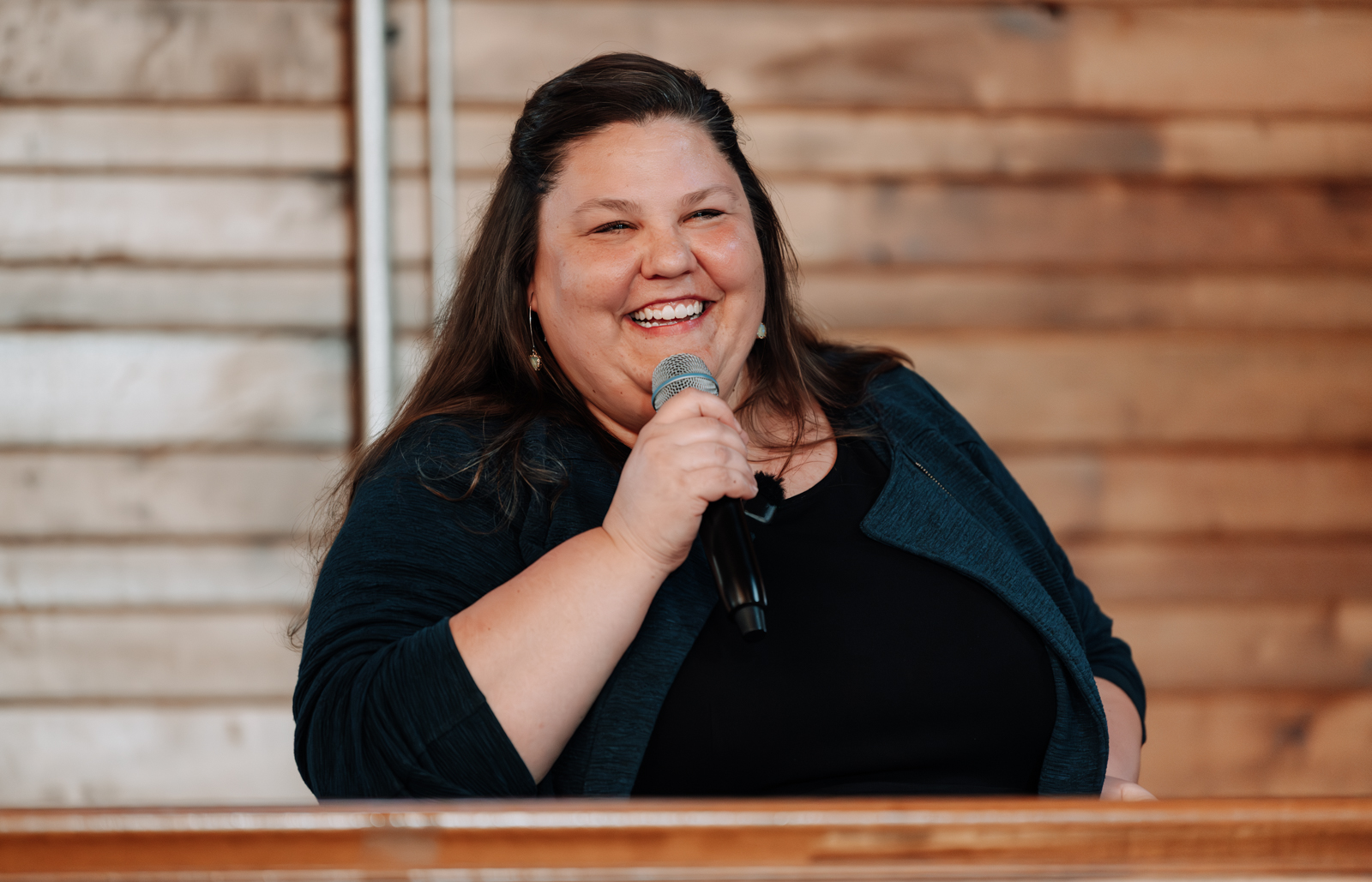Woman speaking at Community Foundation Noble County event, supporting Scholarships and Grants in Noble County communities: Kendallville, Ligonier, Albion, Avilla, Rome City, Cromwell, Wolcottville.
